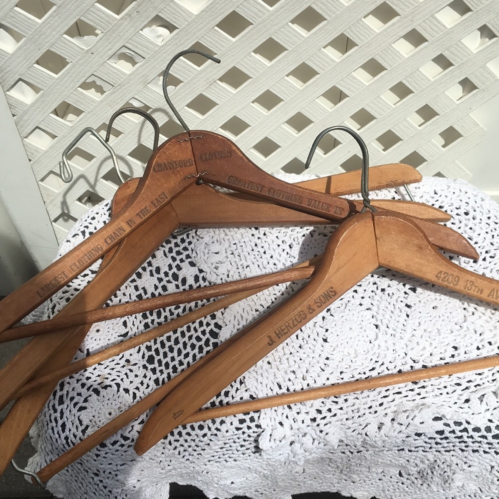 8 Vintage wooden hangers These are really vintage. see markings on some.